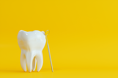 tooth and dental mirror against a bright yellow background.